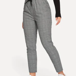 Image of Glen Plaid Drawstring Ankle Cut Pants, showcasing their classic pattern and adjustable drawstring waist for a comfortable and trendy look