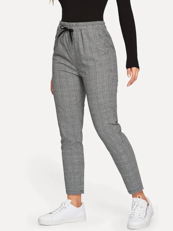 Image of Glen Plaid Drawstring Ankle Cut Pants, showcasing their classic pattern and adjustable drawstring waist for a comfortable and trendy look