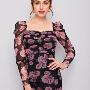 Image of a woman wearing a SHEIN classic floral mesh dress with ruched detail and gigot sleeves, exuding timeless elegance and sophistication