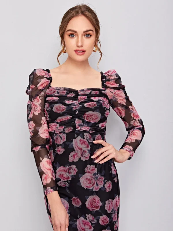 Image of a woman wearing a SHEIN classic floral mesh dress with ruched detail and gigot sleeves, exuding timeless elegance and sophistication