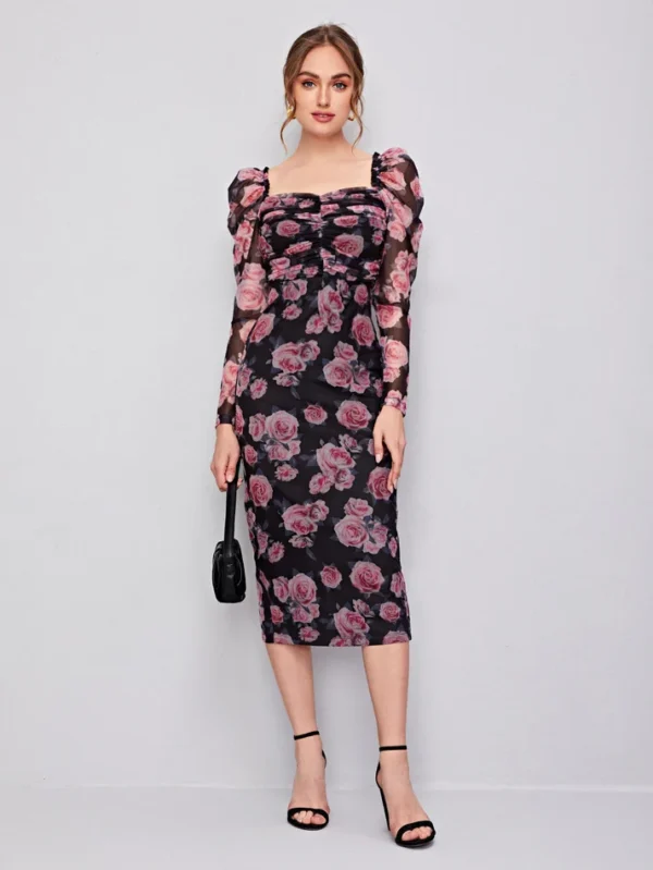 Image of a woman wearing a SHEIN Classic Ruched Detail Gigot Sleeve Floral Mesh Dress, showcasing its elegant floral pattern, graceful gigot sleeves, and intricate ruched detail, ideal for sophisticated occasions