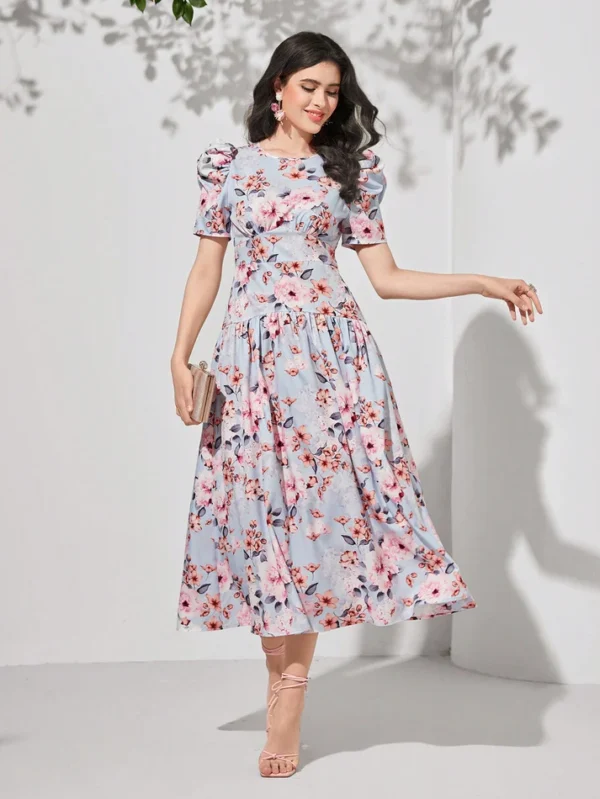 Image of a woman wearing a SHEIN Floral Print Puff Sleeve Dress, showcasing its charming floral pattern and stylish puff sleeves for a chic and feminine look