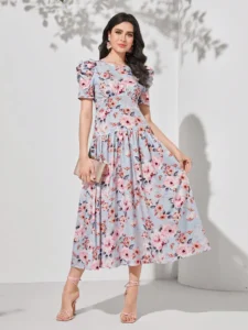 Image of a woman wearing a SHEIN Floral Print Puff Sleeve Dress, showcasing its charming floral pattern and stylish puff sleeves for a chic and feminine look