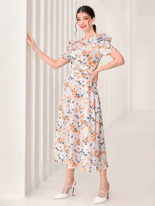 Image of a woman wearing a SHEIN Floral Print Puff Sleeve Dress, showcasing its vibrant floral design and fashionable puff sleeves, perfect for adding a touch of romance to any outfit.