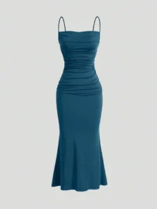  Image of a woman wearing a SHEIN Solid Ruched Mermaid Hem Cami Dress, showcasing its elegant design with ruched detailing and a flattering mermaid hem