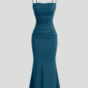 Image of a woman wearing a SHEIN Solid Ruched Mermaid Hem Cami Dress, showcasing its elegant design with ruched detailing and a flattering mermaid hem